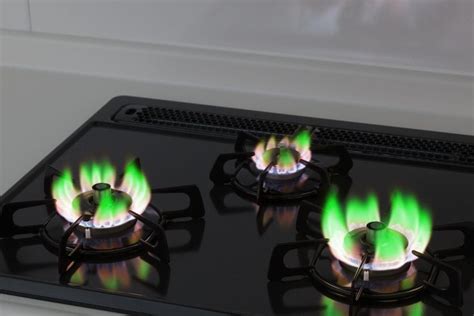 green flame on gas stove